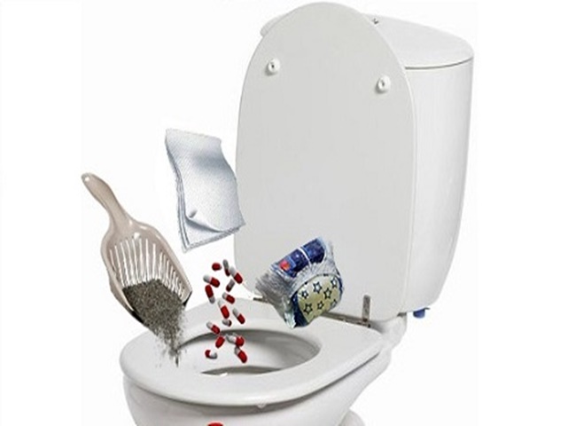 bồn cầu xả nước kh&ocirc;ng xo&aacute;y do bị tắc nghẽn